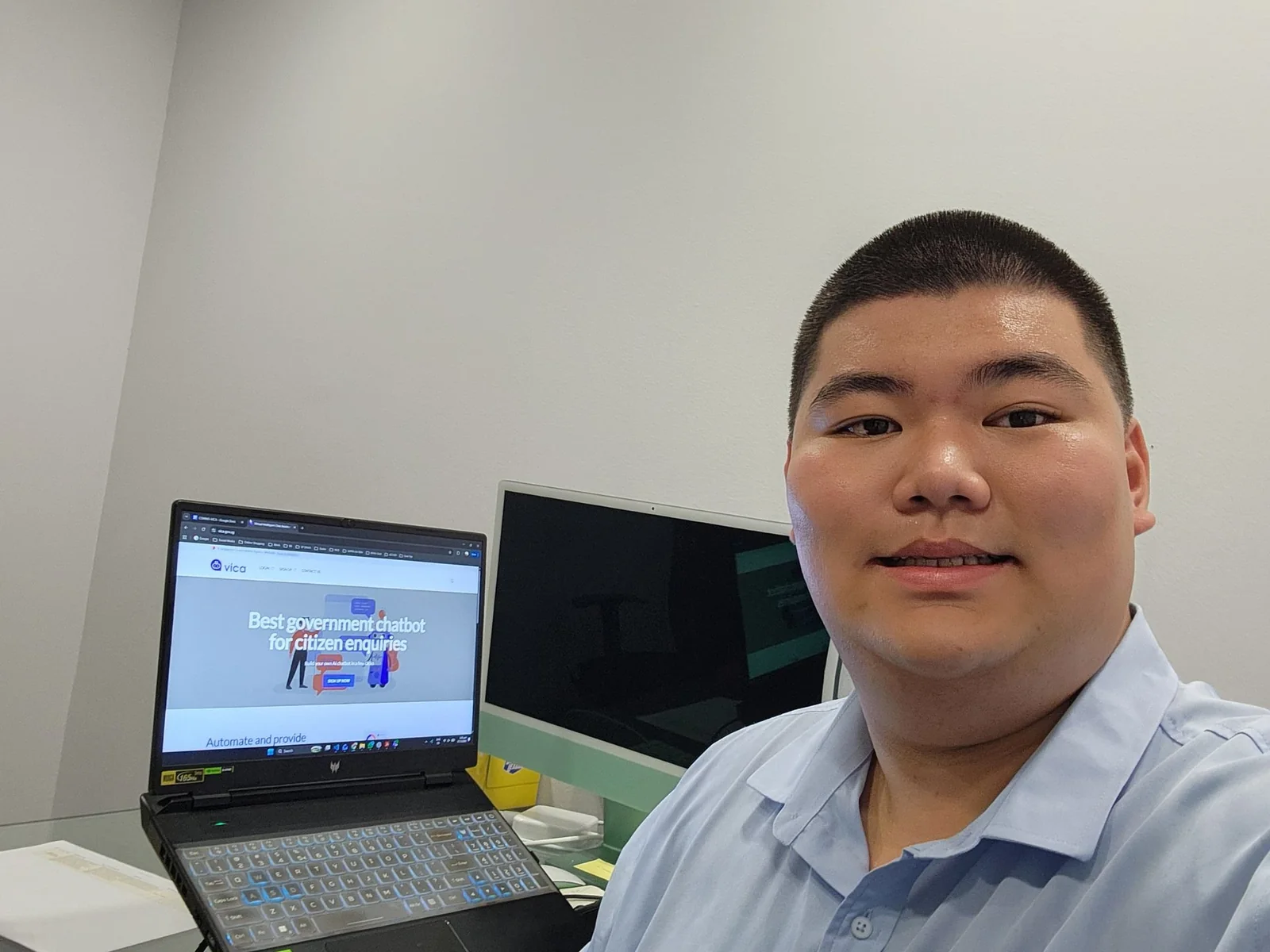 Kun Ming at a workstation with the existing VICA platform visible on a laptop.